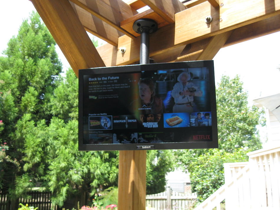 SunBrite Outdoor TV Mounted Under Pergola